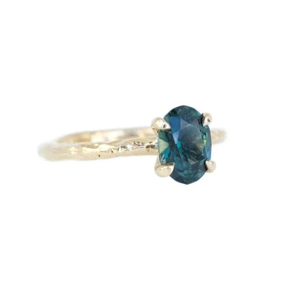 1.60ct Deep Teal Oval Sapphire Ring in Yellow Gold Evergreen 4 Prong Solitaire