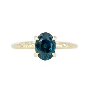 1.60ct Deep Teal Oval Sapphire Ring in Yellow Gold Evergreen 4 Prong Solitaire