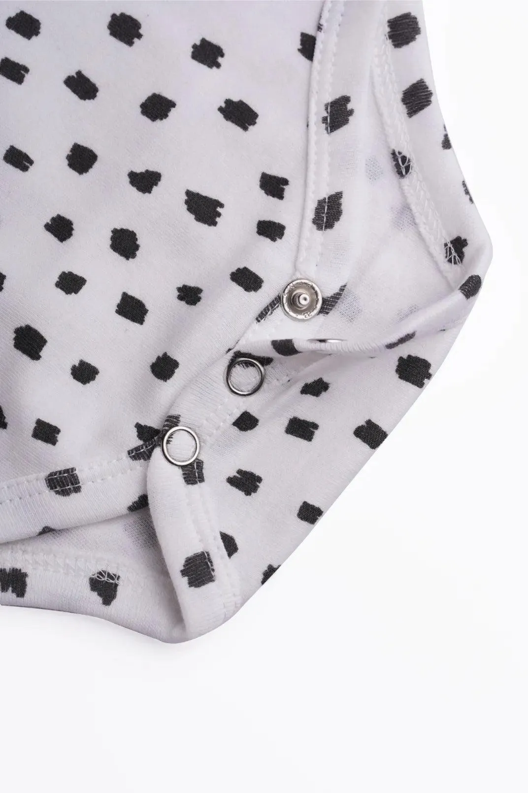 Full sleeve white & black dot pattern bodysuit for baby