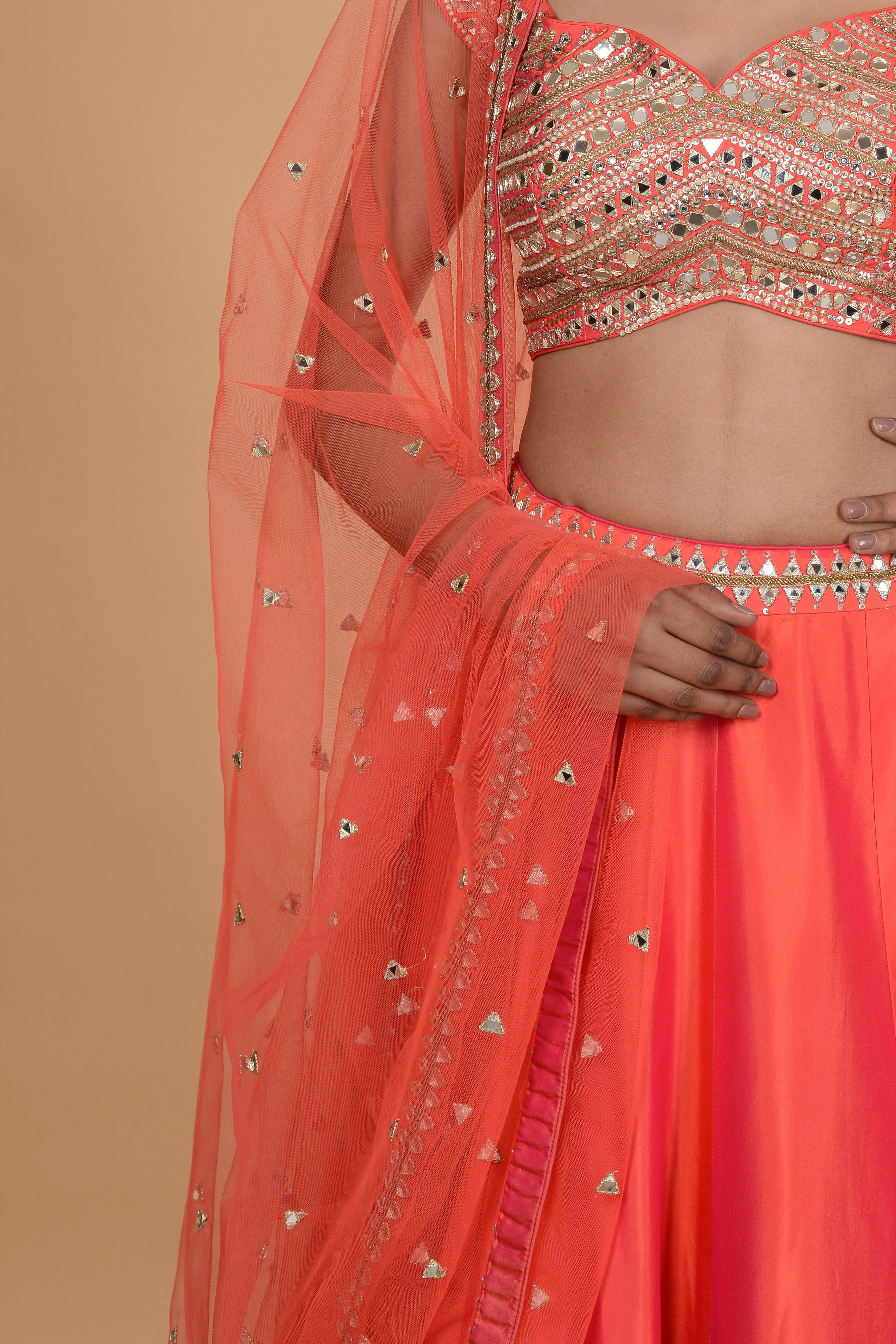 Orange Lehenga Set.