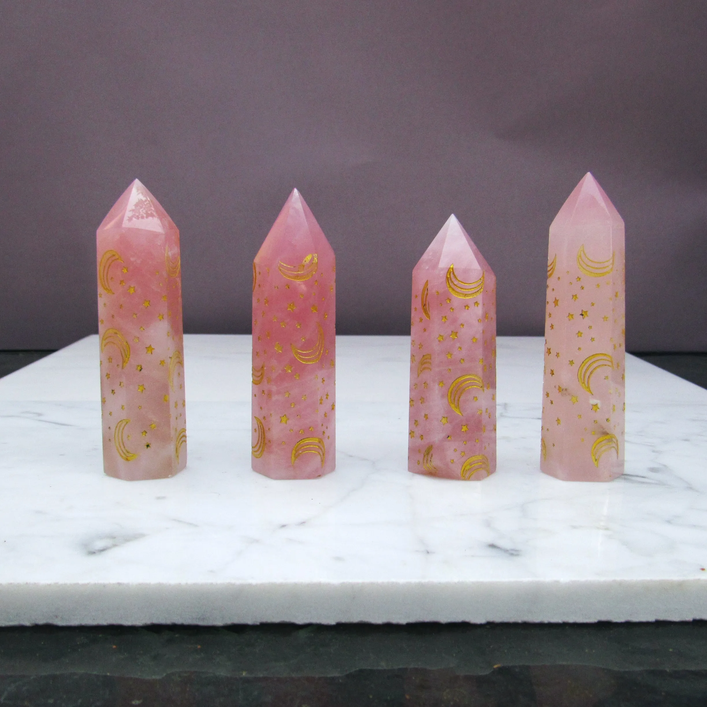 Rose Quartz gemstone healing wands with moons and star designs