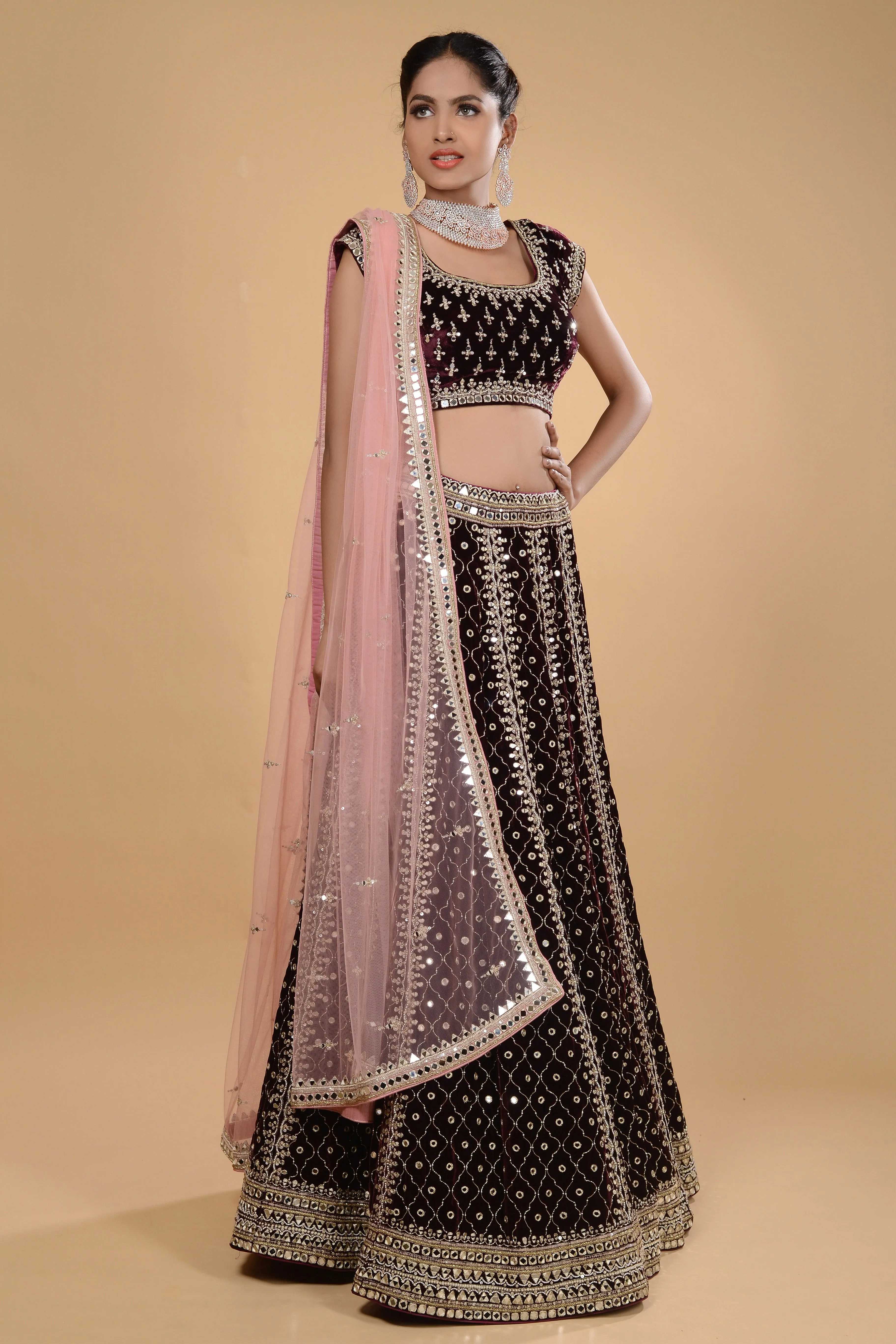 Wine and pink velvet lehenga set.